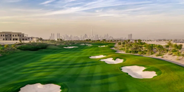 Panoramic view of Dubai Hills Golf Club championship course featuring manicured greens and iconic Burj Khalifa Downtown Dubai skyline