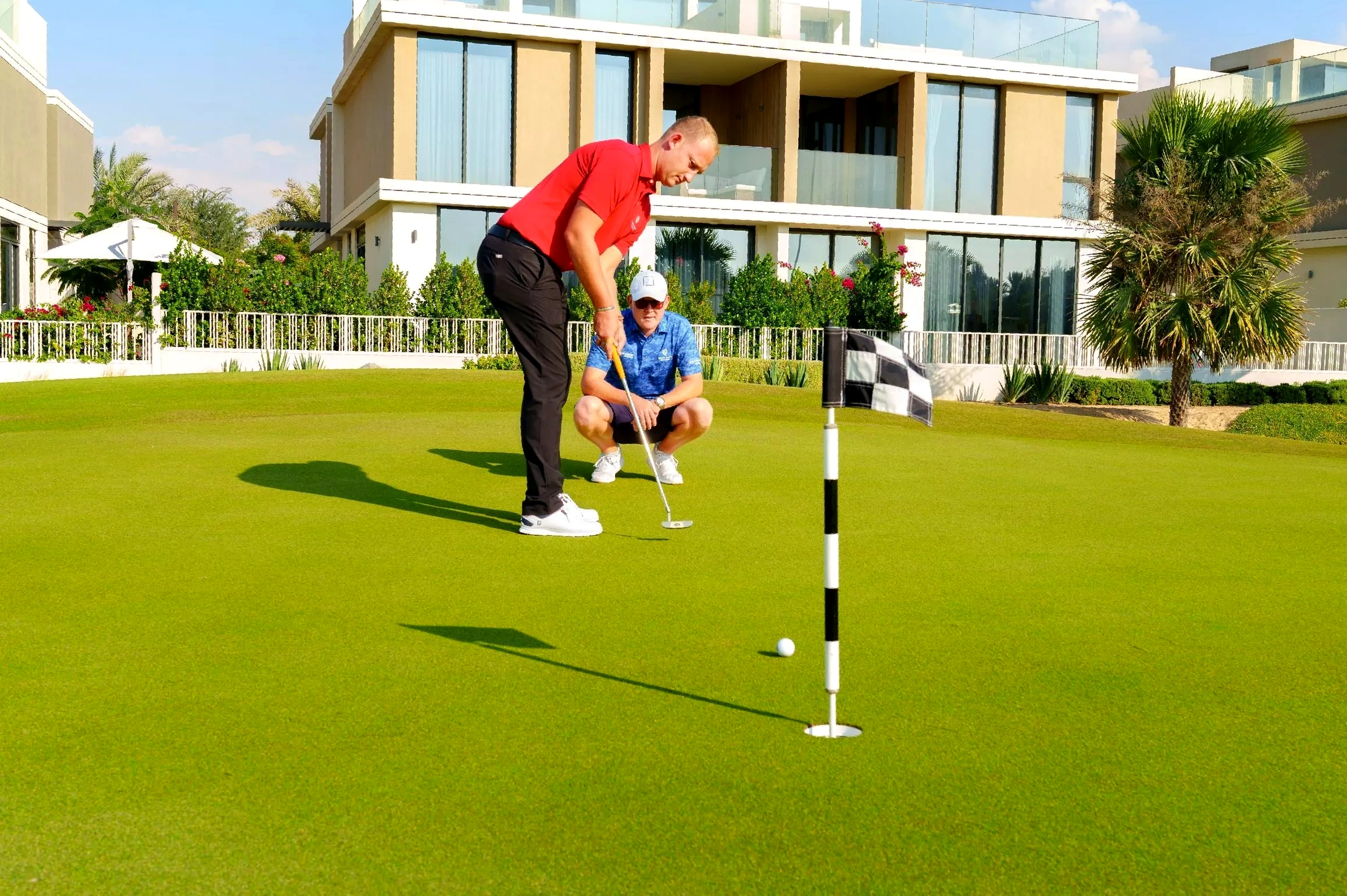 World-class Troon Golf Academy practice facilities and floodlit driving range with TrackMan analytics at Dubai Hills Golf Club