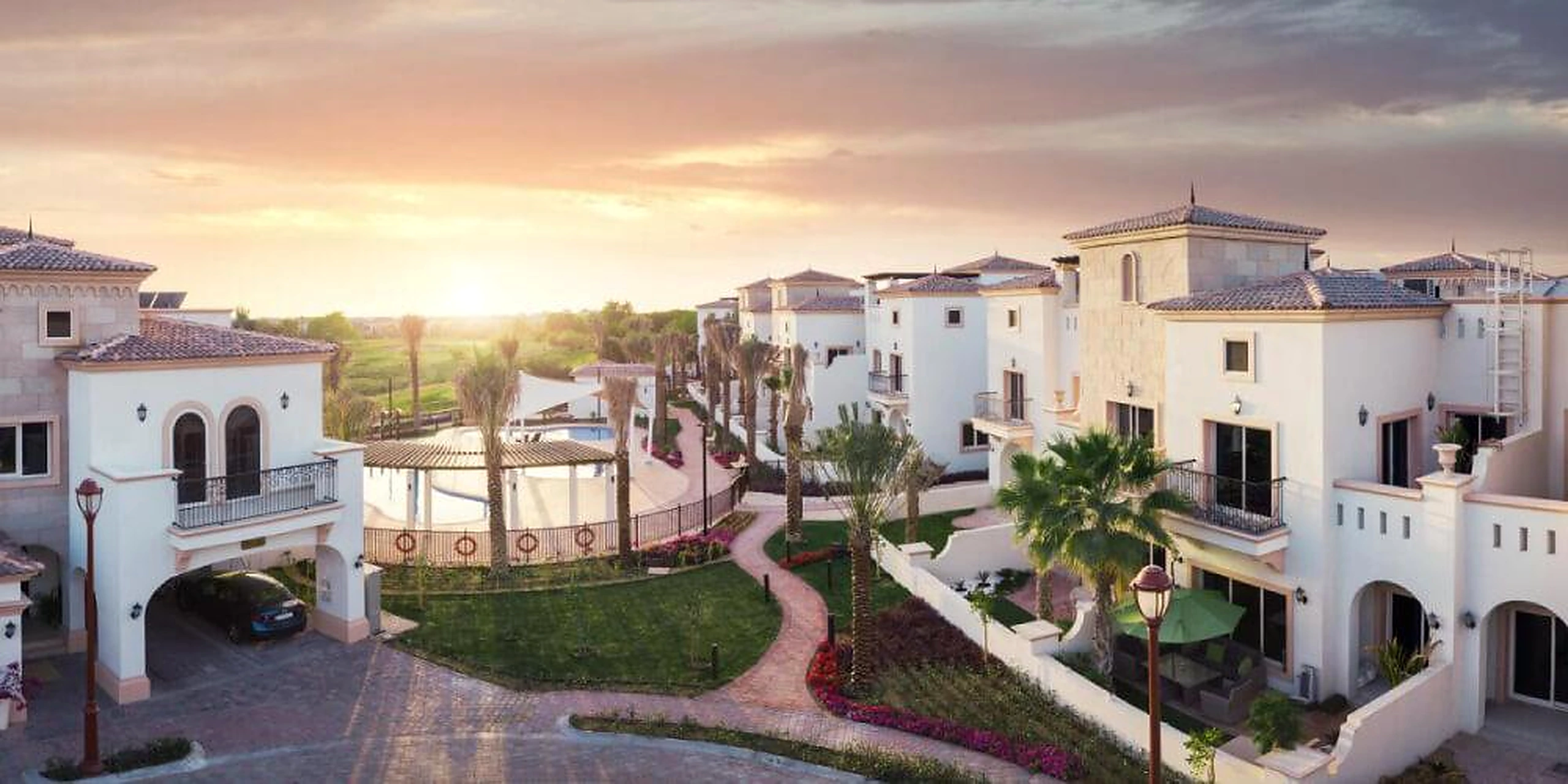 Jumeirah Golf Estates Mediterranean resort community, landscaped gardens and swimming pool