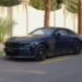 VIP Motors Dubai showroom - official video still, luxury cars on Sheikh Zayed Road